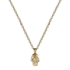10K Gold Tiny Skull Pendant with Diamond Eyes